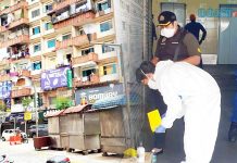 கொரோனா படுத்தும் பாடு: கொட்டும் மழையிலும் சோதனை