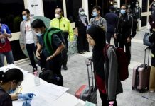 Pengembalian zon merah dikuarantin di pusat-pusat negeri