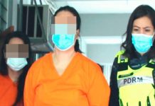 சூட் கேஸில் பெண்ணின் சடலம் இருவர் தடுத்து வைப்பு