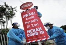 Sekat perjalanan di zon merah