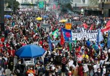 பிரேசிலில் 5 லட்சத்தை கடந்த கோவிட் இறப்புகள்: அதிபருக்கு எதிராக போராட்டம்