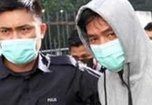 கர்ப்பிணி மனைவிகளை தாக்கிய ஆடவர் குற்றவாளி அல்லர் என்று மறுத்து விசாரணை கோரினார்