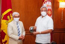 சீனக்கொடியுடனும் சீன கம்யூனிஸ்ட் கட்சி என்ற வாசகத்துடனும் இலங்கையில் நாணயம் வெளியீடு.