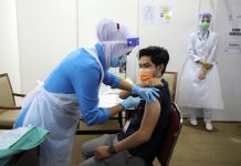 நாட்டின் வயது வந்தோரில் 87.2 விழுக்காட்டினர் முழுமையாக தடுப்பூசி செலுத்தி கொண்டுள்ளனர்