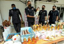 போலி மதுபானம் காய்ச்சி, விற்பனையில் ஈடுபட்ட கும்பல் கைது; வெ.100,000 மதிப்புள்ள 700க்கும் மேற்பட்ட போலி மதுபோத்தல்கள் பறிமுதல்