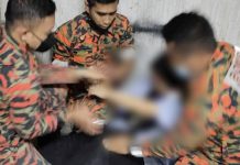 12ஆவது மாடியில் குதிக்க முயன்ற பெண் தீயணைப்பு துறையினரால் காப்பாற்றப்பட்டார்