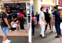 வணிக வளாக நுழைவாயிலில் பாதுகாவலரை தாக்கியதாக இருவரிடம் விசாரணை