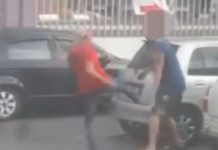 நடுரோட்டில் சண்டையிட்ட இருவர் கைது