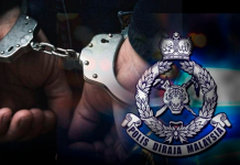 ஜோகூரில் தம்பதிகளை மிரட்டி பணம் பறித்த குற்றச்சாட்டில் இரு துணை போலீசார் கைது