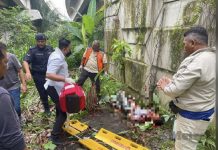 கார் சறுக்கி சாலை தடுப்பில் மோதி 10 மீட்டர் ஆழத்தில் விழுந்தது; ஓட்டுநருக்கு பலத்த காயம்