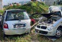 அவர் ஓட்டிச் சென்ற கார் சறுக்கி, சாலைத்தடுப்பில் மோதியதில் பெண் ஒருவர் உயிரிழந்தார்