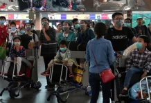 சீன வருகையாளர்களுக்கு கோவிட்-19 கட்டுப்பாடுகளை விதிக்க, அரசாங்கம் வலியுறுத்தியுள்ளது