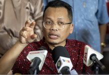 நிக் நஸ்மி, ‘தேர்தலுக்கான திட்ட நிதி’ தகவல் கசிவுத் தொடர்பில் போலீஸ் புகார்