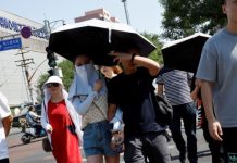 சீனாவைச் சுட்டெரிக்கும் வெயில்: பெய்ஜிங்கில் சிவப்பு எச்சரிக்கை