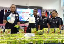 Sorok dadah dalam kaki meja besi