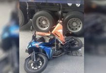 தெப்ராவ் தொழில் பூங்கா அருகே மோட்டார் சைக்கிள் டிரெய்லர் மோதியதில் பெண் உயிரிழந்தார்