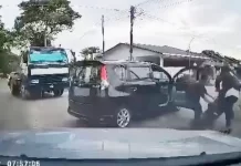 பெண்ணின் கைப்பையைப் பறித்து காயம் விளைவித்த ஆடவர்கள் கைது