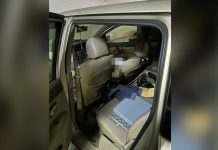 கூச்சிங் பேரங்காடியில் காரில் இறந்து கிடந்த பெண்