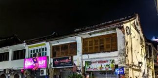 பினாங்கில் பாரம்பரியக் கட்டிடத்திலிருந்து சிமெண்ட் சிதைவுகள் பெயர்ந்து விழுந்ததில் பெண் காயமடைந்தார்